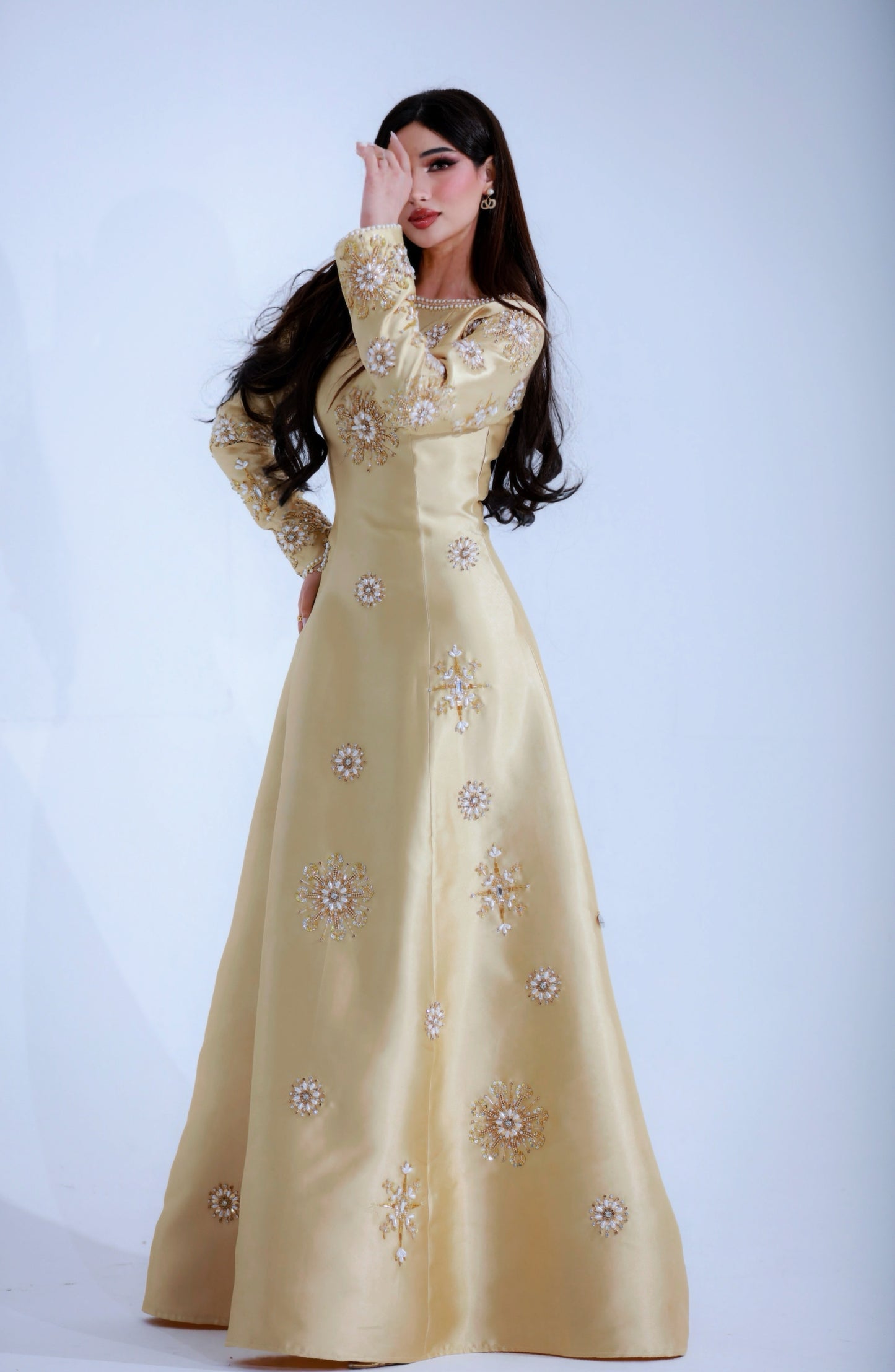 Luxurious Beige Gown with Golden Embroidery